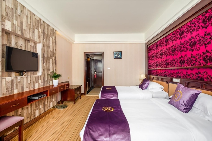 Imagen de la habitación del Hotel Yangshuo New Century Vip Building. Foto 12