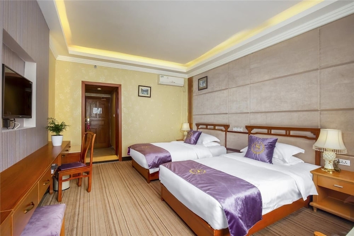 Imagen de la habitación del Hotel Yangshuo New Century Vip Building. Foto 13