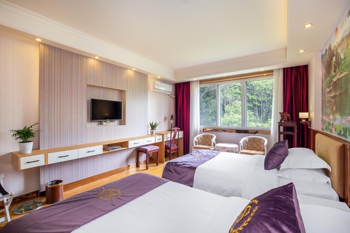 Imagen de la habitación del Hotel Yangshuo New Century Vip Building. Foto 15