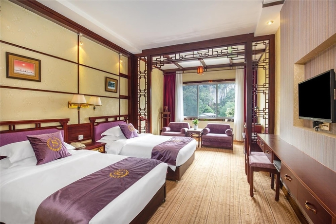 Imagen de la habitación del Hotel Yangshuo New Century Vip Building. Foto 17