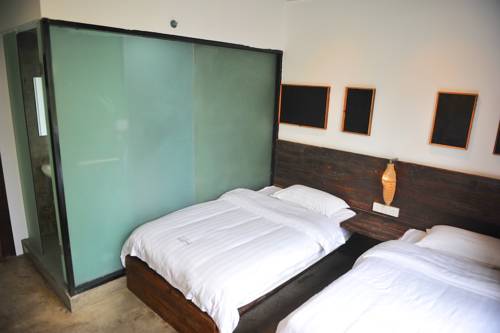 Imagen de la habitación del Hotel Yangshuo Sudder Street Guesthouse. Foto 1