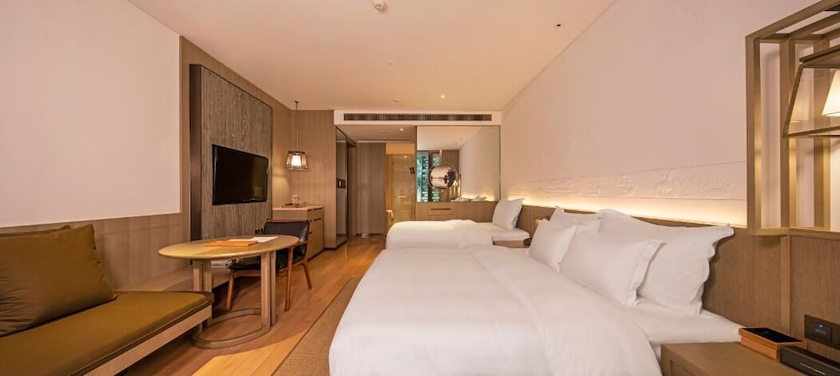 Imagen de la habitación del Hotel Yangshuo Sugarhouse. Foto 11