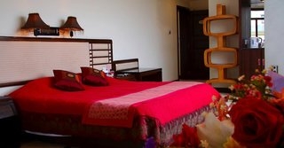 Imagen de la habitación del Hotel Yangshuo Tangrenjie. Foto 4