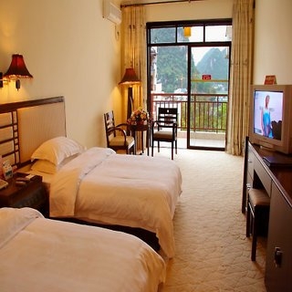 Imagen de la habitación del Hotel Yangshuo Tangrenjie. Foto 6
