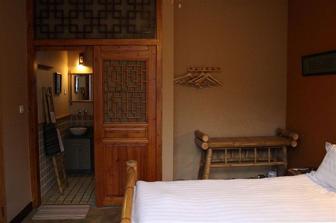 Imagen de la habitación del Hotel Yangshuo Village Inn. Foto 10