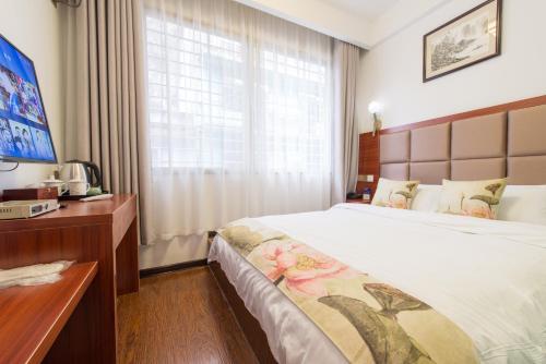 Imagen de la habitación del Hotel Yangshuo Xiangyi Inn. Foto 5