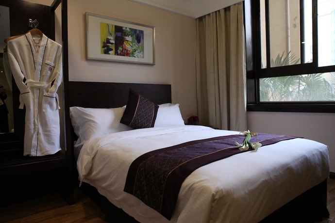 Imagen de la habitación del Hotel Yangtze Hotel. Foto 14