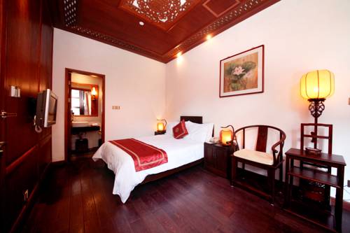 Imagen de la habitación del Hotel Yangzhou Centre And Residence. Foto 1
