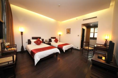 Imagen de la habitación del Hotel Yangzhou Centre And Residence. Foto 3