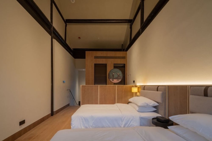 Imagen de la habitación del Hotel Yangzhou Guangling Youxiong. Foto 4