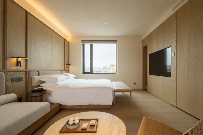 Imagen de la habitación del Hotel Yangzhou Guangling Youxiong. Foto 6