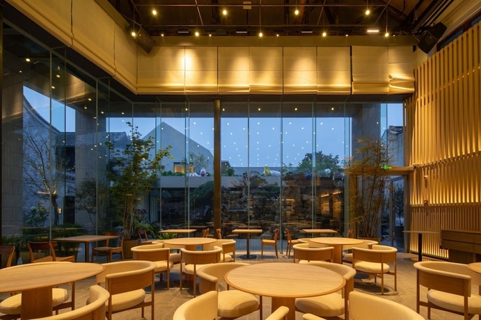 Imagen del bar/restaurante del Hotel Yangzhou Guangling Youxiong. Foto 3
