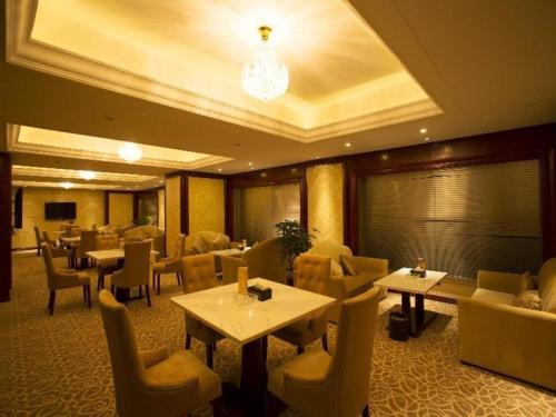 Imagen general del Hotel Yangzhou Pearl International. Foto 8