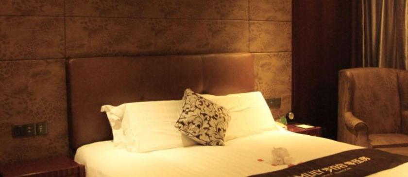 Imagen de la habitación del Hotel Yangzhou Pearl International Hotel. Foto 10