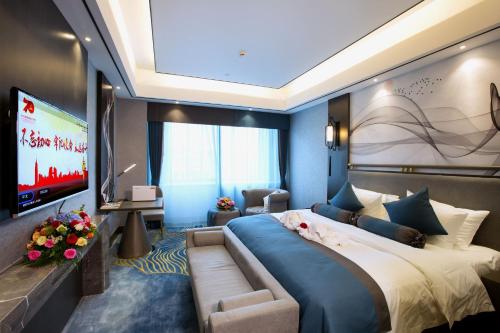 Imagen de la habitación del Hotel Yangzi International. Foto 15