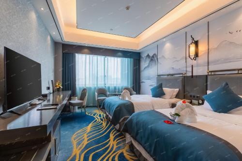 Imagen de la habitación del Hotel Yangzi International. Foto 16