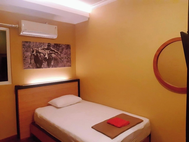 Imagen de la habitación del Hotel Yani Homestay. Foto 4