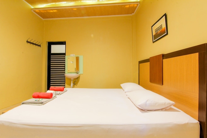 Imagen de la habitación del Hotel Yani Homestay. Foto 7
