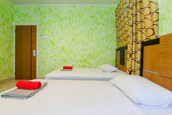 Imagen de la habitación del Hotel Yani Homestay. Foto 8