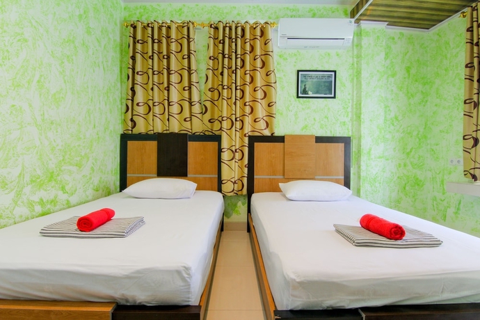 Imagen de la habitación del Hotel Yani Homestay. Foto 9