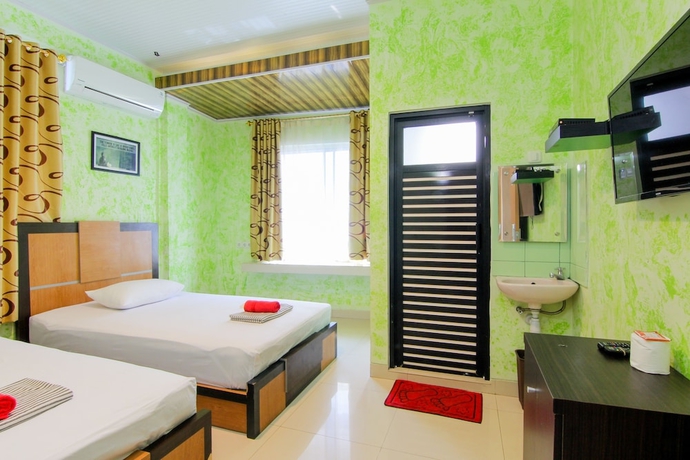 Imagen de la habitación del Hotel Yani Homestay. Foto 10