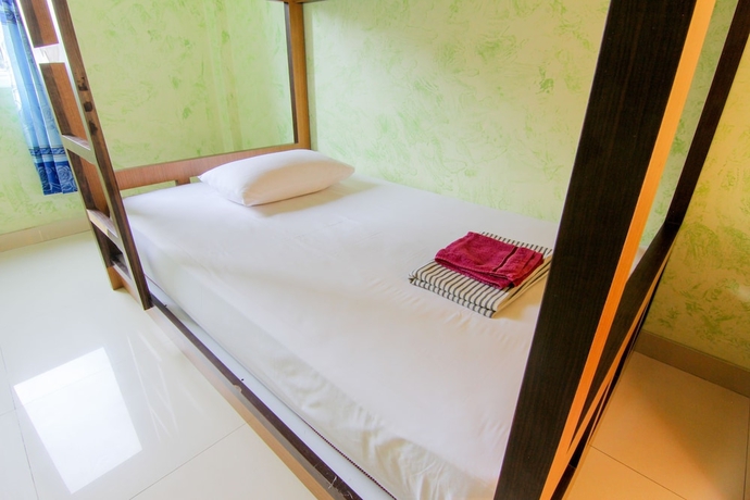 Imagen de la habitación del Hotel Yani Homestay. Foto 12