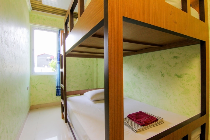 Imagen de la habitación del Hotel Yani Homestay. Foto 13