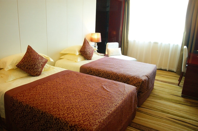 Imagen de la habitación del Hotel Yanling. Foto 11
