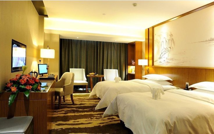 Imagen de la habitación del Hotel Yannian Huijing Hotel. Foto 2