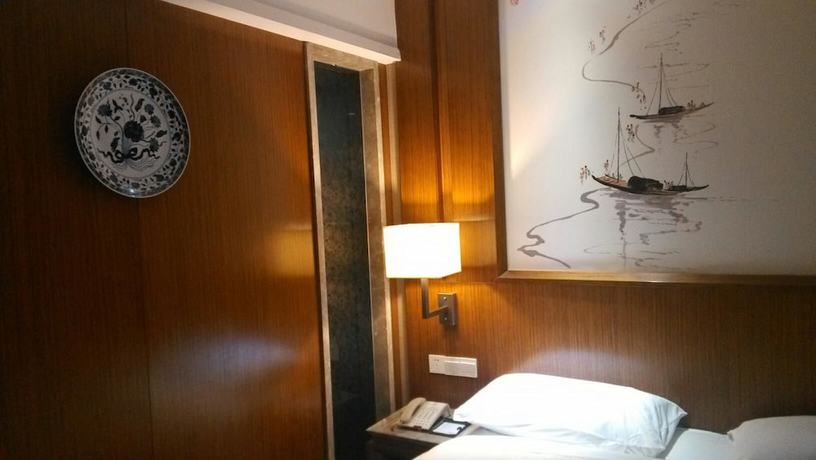 Imagen de la habitación del Hotel Yannian Huijing Hotel. Foto 9