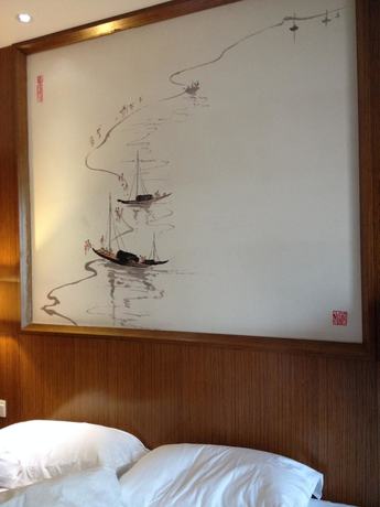 Imagen de la habitación del Hotel Yannian Huijing Hotel. Foto 11