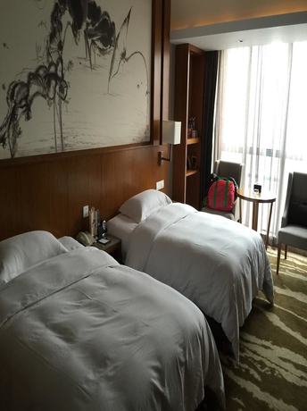 Imagen de la habitación del Hotel Yannian Huijing Hotel. Foto 12
