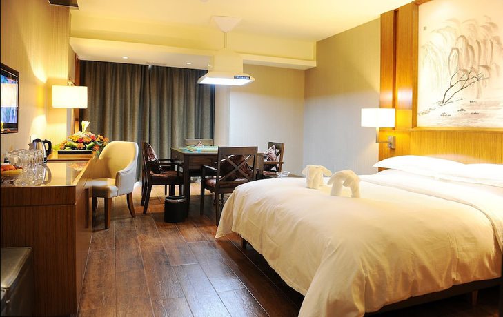 Imagen de la habitación del Hotel Yannian Huijing Hotel. Foto 13