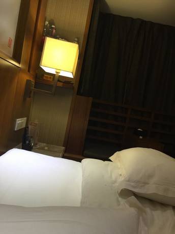 Imagen de la habitación del Hotel Yannian Huijing Hotel. Foto 15