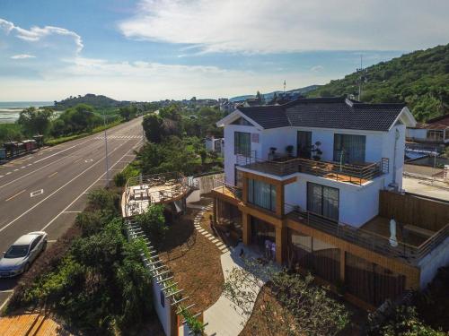 Imagen de la habitación del Hotel Yansu Sport Culture Guesthouse. Foto 7