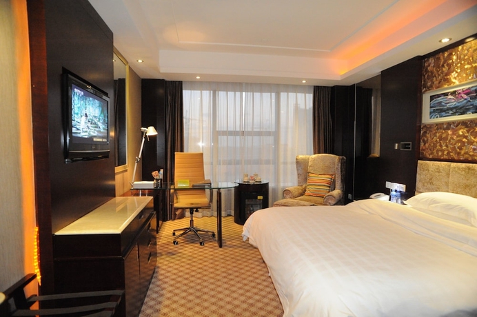 Imagen de la habitación del Hotel Yantai Asia. Foto 3