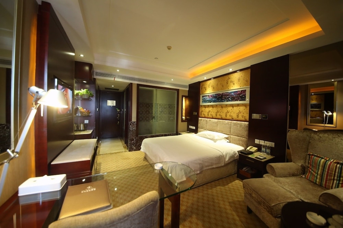 Imagen de la habitación del Hotel Yantai Asia. Foto 8