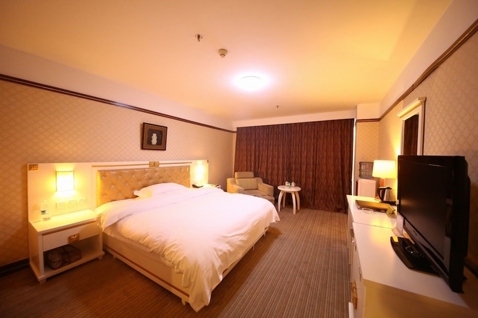 Imagen de la habitación del Hotel Yantai Asia. Foto 10