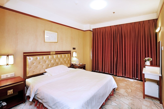 Imagen de la habitación del Hotel Yantai Asia. Foto 11