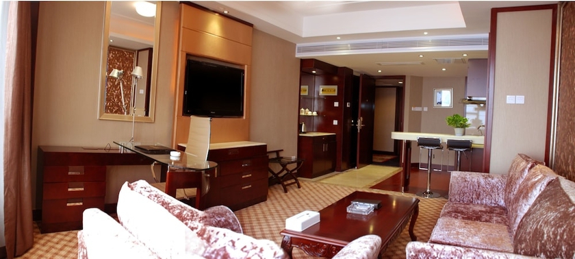 Imagen de la habitación del Hotel Yantai Asia. Foto 14