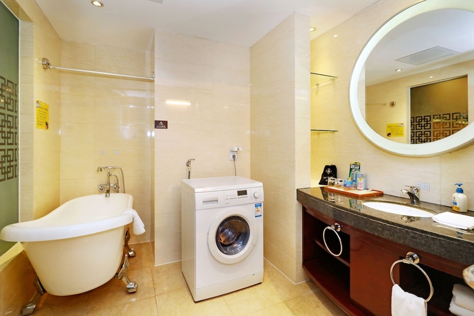 Imagen de la habitación del Hotel Yantai Asia. Foto 16