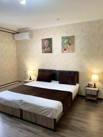 Imagen de la habitación del Hotel Yantai. Foto 2