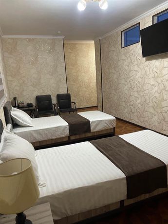 Imagen de la habitación del Hotel Yantai. Foto 3