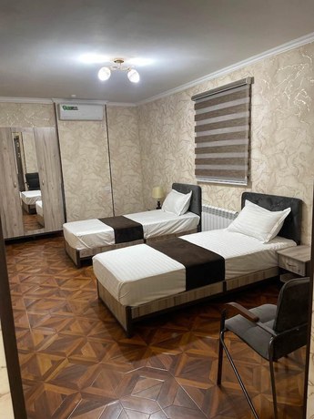 Imagen de la habitación del Hotel Yantai. Foto 4