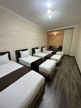 Imagen de la habitación del Hotel Yantai. Foto 6