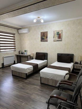 Imagen de la habitación del Hotel Yantai. Foto 9