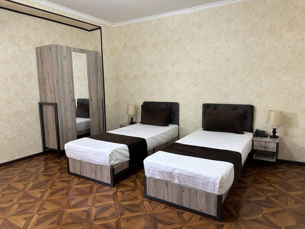 Imagen de la habitación del Hotel Yantai. Foto 11