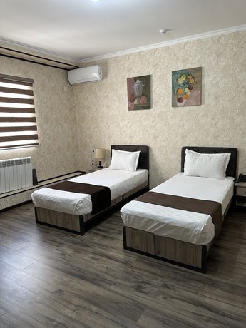 Imagen de la habitación del Hotel Yantai. Foto 12