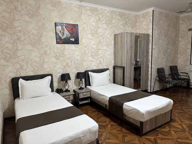 Imagen de la habitación del Hotel Yantai. Foto 13