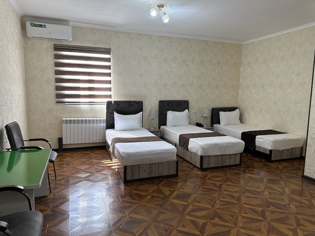 Imagen de la habitación del Hotel Yantai. Foto 14